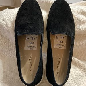 Women’s black suede slip ins